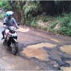 Jalan di Desa Nanggerang rusak parah.